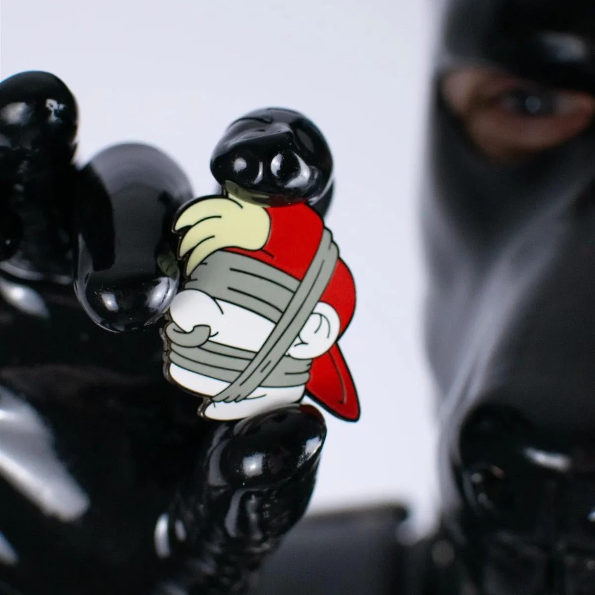 Gagged Boy Flag Pin